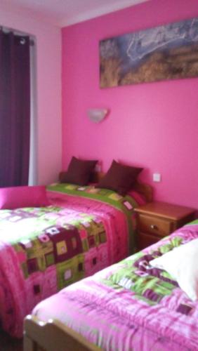 Una cama o camas en una habitación de Residencial Moeda
