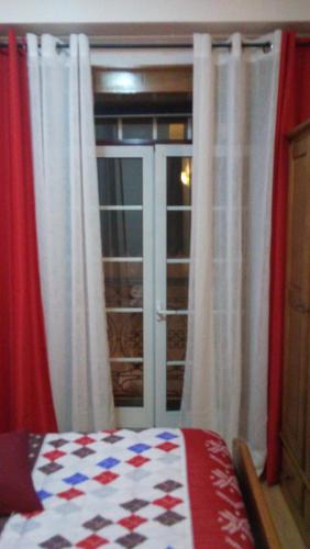 Una cama o camas en una habitación de Residencial Moeda