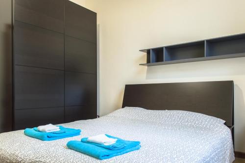 Cama o camas de una habitación en Sant'Orsola Apartment