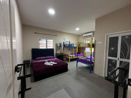 Ένα ή περισσότερα κρεβάτια σε δωμάτιο στο Chatek Family Inn
