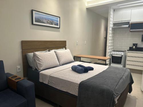 En eller flere senge i et værelse på Loft Copacabana