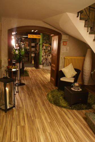a living room with a couch and a table at Hotel Storchen in Rheinfelden