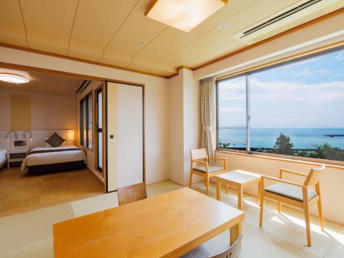 Postel nebo postele na pokoji v ubytování KAMENOI HOTEL Yaizu
