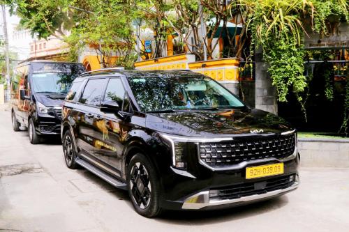 a black suv parked on the side of a street at Son Hoi An Boutique Hotel & Spa in Hoi An
