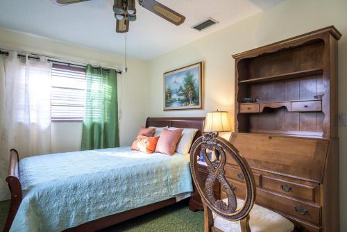 Postel nebo postele na pokoji v ubytování Oasis1080 Resort