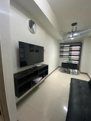 Photo de la galerie de l'établissement Cozy home stay at S residences Moa, à Manille