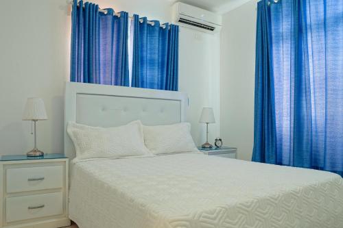 Postel nebo postele na pokoji v ubytování Ria Hotel
