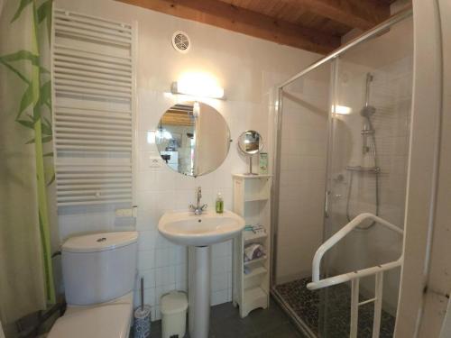 a bathroom with a sink and a shower and a toilet at Maison de charme à Brantôme, animaux admis, parking inclus - FR-1-616-461 in Brantôme
