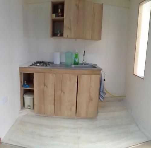Dapur atau dapur kecil di El Jardín cerca Aeropuerto de Pasto, comodidad y descanso