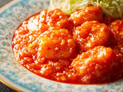 a plate of food with shrimp in a sauce at Rembrandt Hotel Atsugi in Atsugi