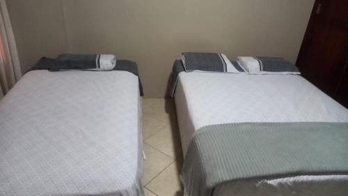 Postel nebo postele na pokoji v ubytování Hostal Borsalino