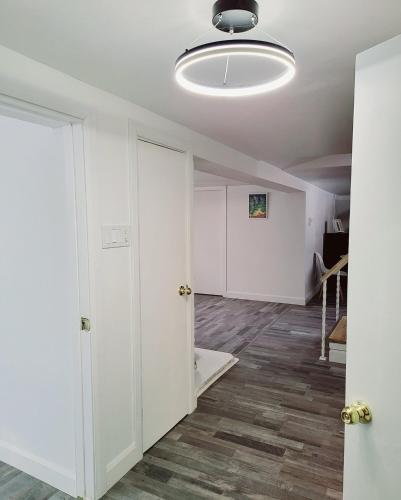 an empty room with white walls and a ceiling at 10 minutes to Montreal entire place 2 bedrooms private entrance in Laprairie