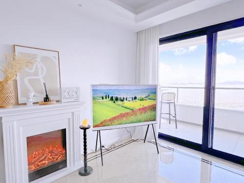 TV/Unterhaltungsangebot in der Unterkunft Jing Cozy Oceanview Home