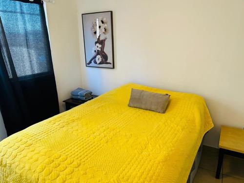 Ένα ή περισσότερα κρεβάτια σε δωμάτιο στο Departamento en playas de Tijuana