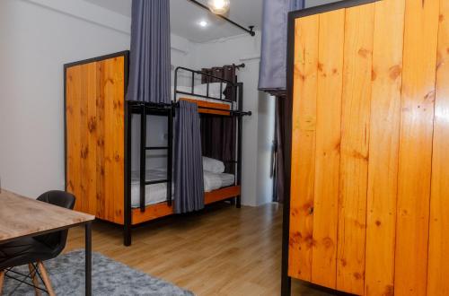 Ένα ή περισσότερα κρεβάτια σε δωμάτιο στο 22 Hostel