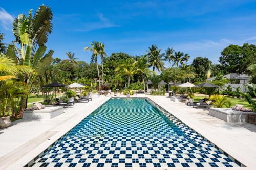 a pool at the resort at Moorea Boutique Resort Samui in Ban Tai
