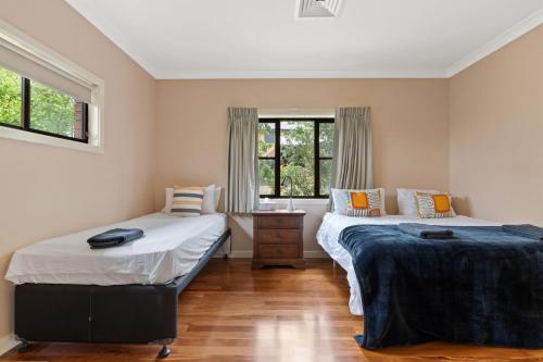 Postel nebo postele na pokoji v ubytování Mountain Haven 5-BR Escape