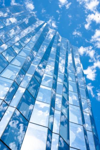 a tall glass building with the sky in the background at Viceroy Chicago in Chicago