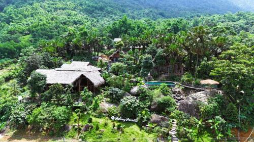 an aerial view of a resort in the jungle at Pu Luong Paradise in Hương Bá Thước