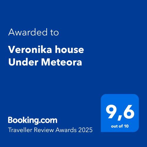a blue sign with the text awarded to veronica house under melbourne at Veronika house Under Meteora in Sarakína