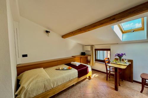 Borgo di Porlezza - Happy Rentalsにあるベッド