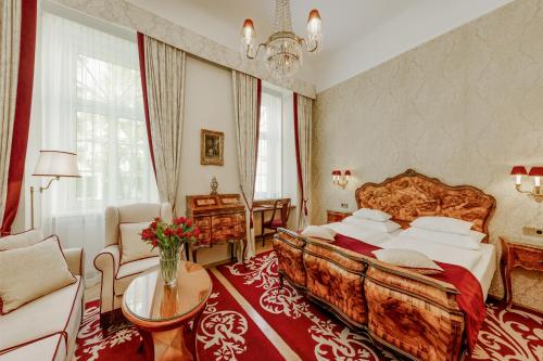 Posteľ alebo postele v izbe v ubytovaní Hotel Stefanie - VIENNA'S OLDEST HOTEL