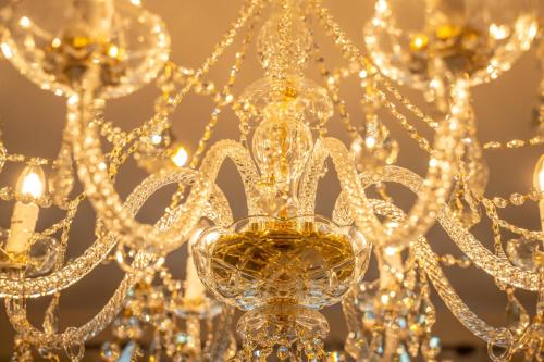 a close up of a chandelier at La Rocca di Camporgiano in Camporgiano