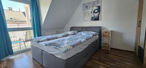 Postel nebo postele na pokoji v ubytování Vienna Airport Residences
