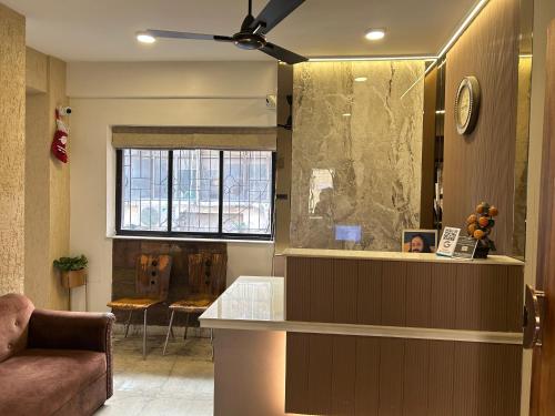 Ruang duduk di Aster Guest House