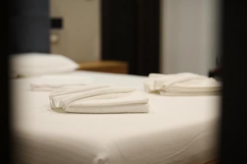 Cama o camas de una habitación en Hotel Salvadore