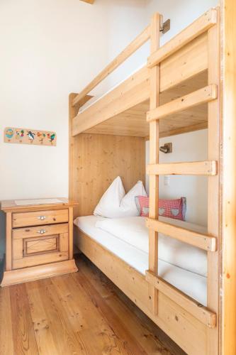 Ένα ή περισσότερα κρεβάτια σε δωμάτιο στο Appartement Arnoldgut