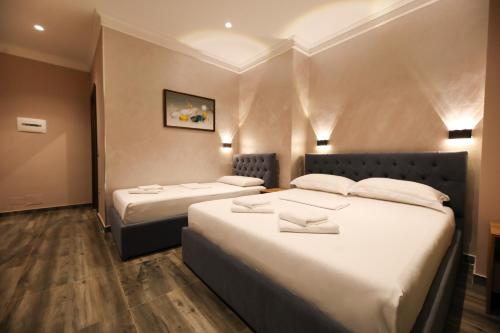 Cama o camas de una habitación en Hotel Salvadore