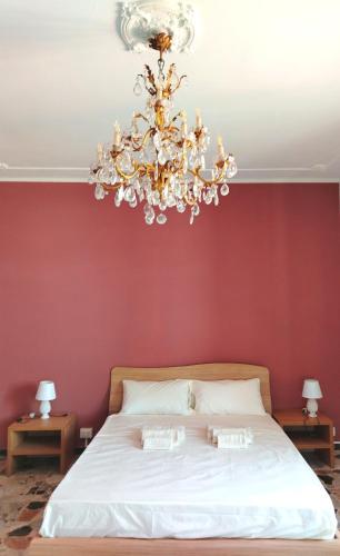 Postel nebo postele na pokoji v ubytování Torres Rooms Sassari