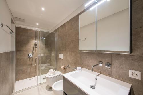 Koupelna v ubytování Corte di Ascona Apartments - Happy Rentals