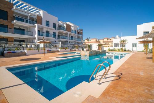 an image of a swimming pool at a hotel at Apartment Laguna Azul in El Mojón