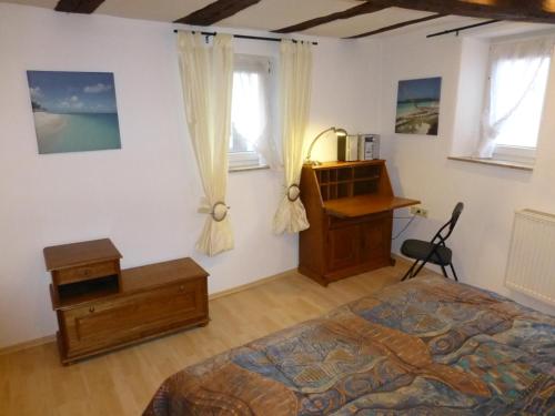 Postel nebo postele na pokoji v ubytování IFAM - Ihr Ferienhaus am Main