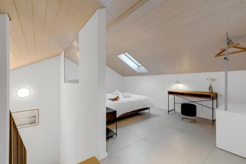 Postel nebo postele na pokoji v ubytování Corte di Ascona Apartments - Happy Rentals