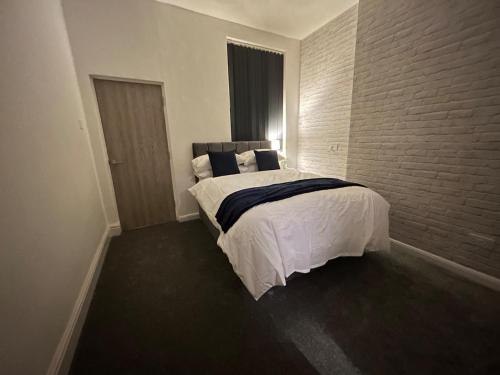 Katil atau katil-katil dalam bilik di Spotless Ground Floor Apartment