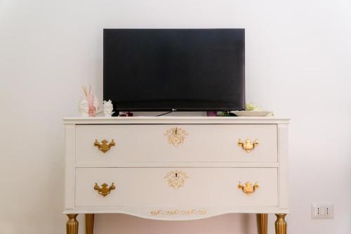 TV a/nebo společenská místnost v ubytování Melficta House