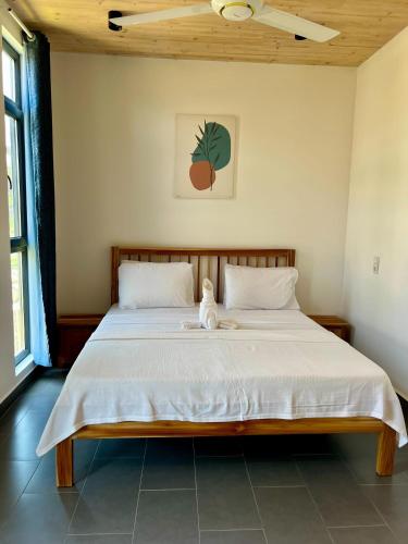 Ένα ή περισσότερα κρεβάτια σε δωμάτιο στο Zanzibar Stays - Paje Accommodation Collection