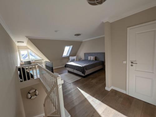 Ένα ή περισσότερα κρεβάτια σε δωμάτιο στο Strandburg-App-14