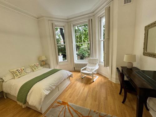 Ένα ή περισσότερα κρεβάτια σε δωμάτιο στο Exceptionally Large Newly-Refurbished 1-Bed Flat in Hither Green