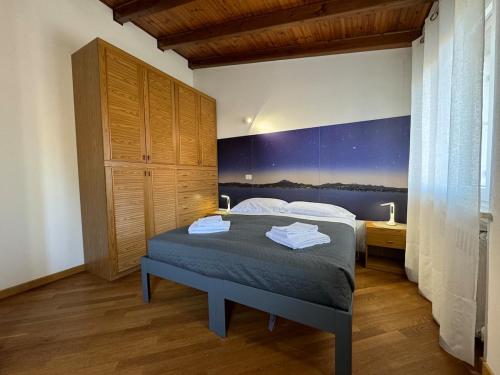 Кровать или кровати в номере Anfite Apartments Villa Sicilia