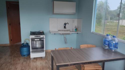 Kuchyň nebo kuchyňský kout v ubytování Paraíso azul Ilhéus itacare