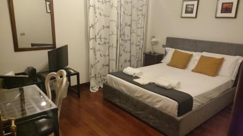 Ένα ή περισσότερα κρεβάτια σε δωμάτιο στο VILLA MASI Rental Rooms