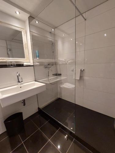 Koupelna v ubytování Hotel Wünschmann