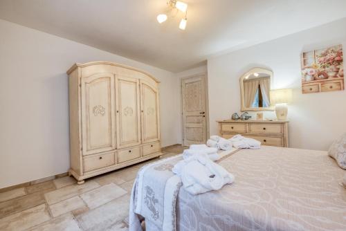 Ένα ή περισσότερα κρεβάτια σε δωμάτιο στο Villa Barastula, confort e relax