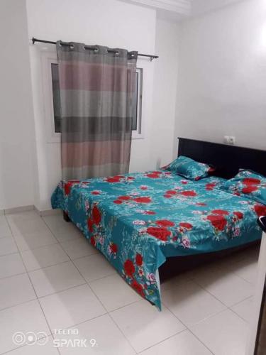 Llit o llits en una habitació de Appartement totsi
