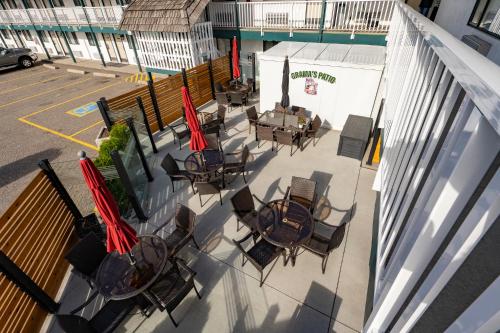 an overhead view of a patio with tables and chairs at Grama's Inn in Prince George