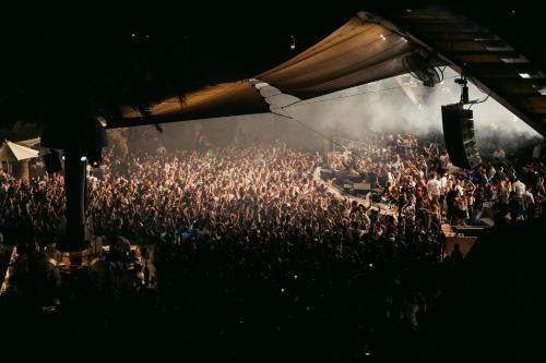 a large crowd of people at a concert at Destino Five Ibiza - 5-Star Grand Luxe Resort in Talamanca